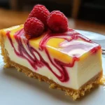 LEMON RASPBERRY SWIRL CHEESECAKE